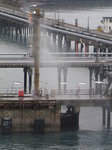 SX01183 Water spraying from oil tanker rig in Milford Haven.jpg